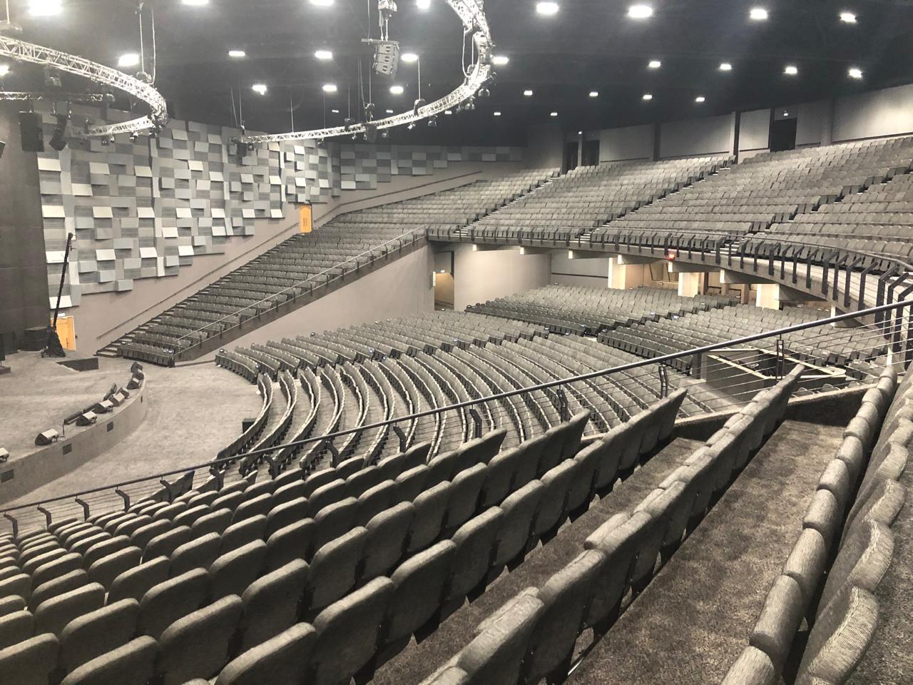 Tiered grey auditorium seating in a Johannesburg conference venue